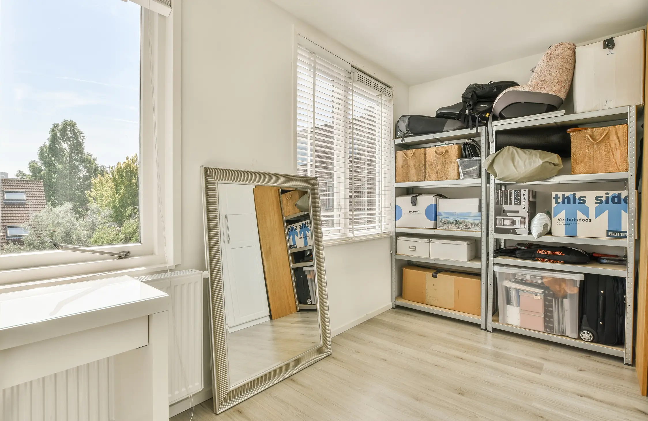 Modern storage solutions in Ahmedabad home interior design with organized and clutter-free space