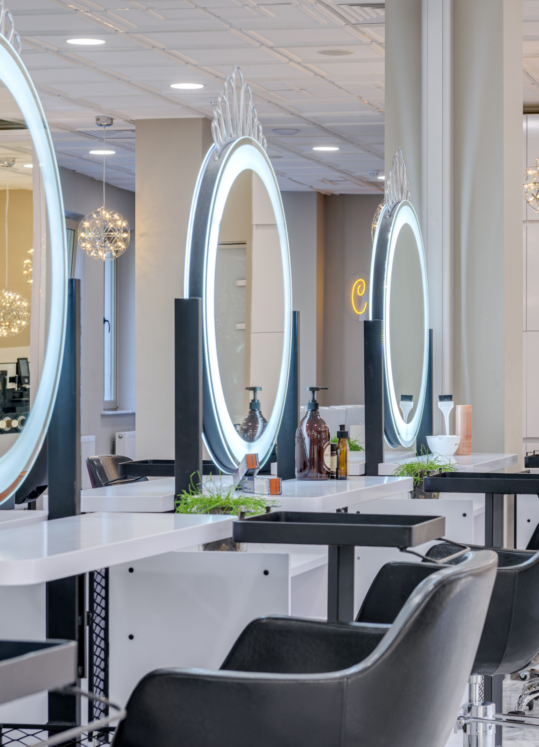 Luxury salon interior design in Ahmedabad by Ocean Design Studio with modern styling stations and elegant décor