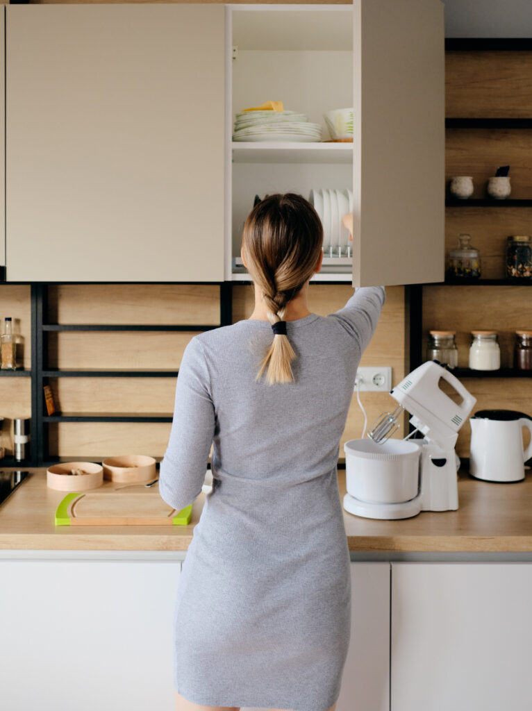Functional modular kitchen interior with organised cabinetry, practical storage, modern appliances, and efficient workspace planning.