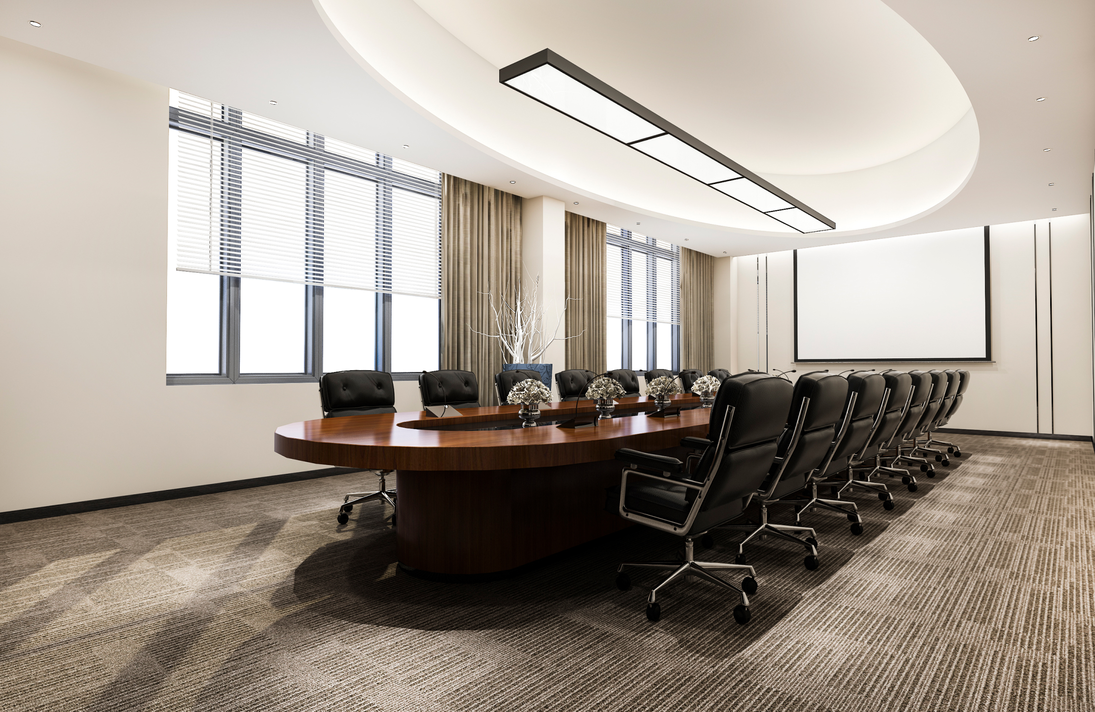 Government office conference room with a large meeting table, comfortable chairs, presentation screen, and modern lighting.
