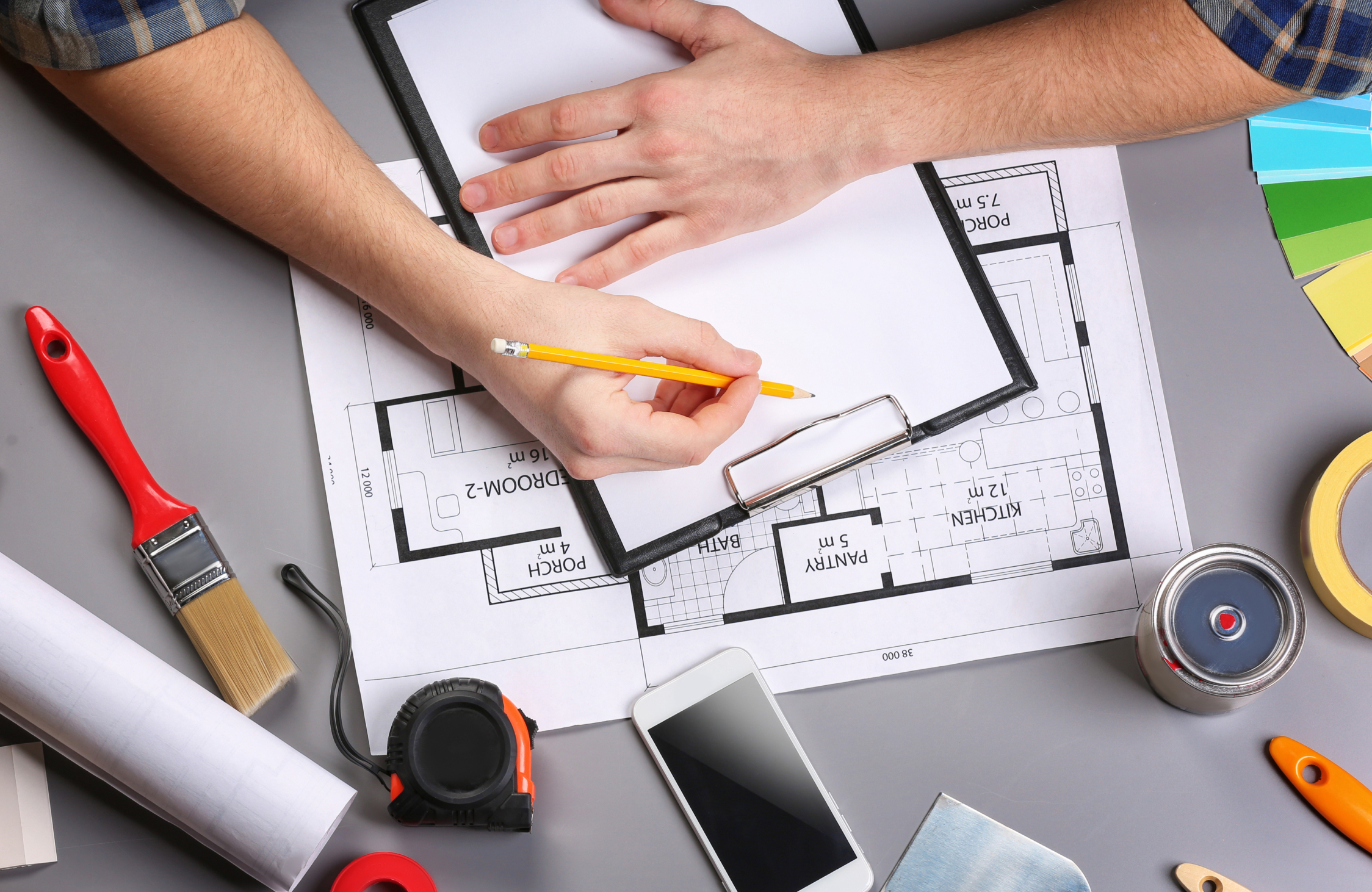 Home interior design planning with floor plans, colour samples, fabric selections, and material references.