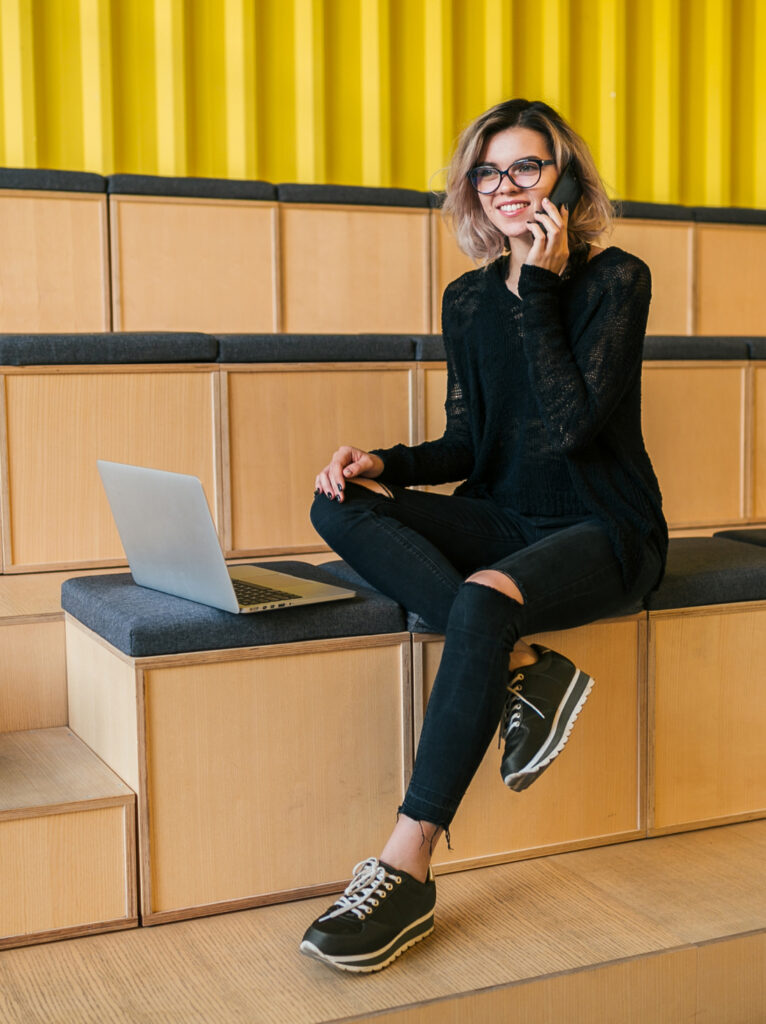 Luxury office lounge with sophisticated seating, warm lighting, premium finishes, and a contemporary workspace design.