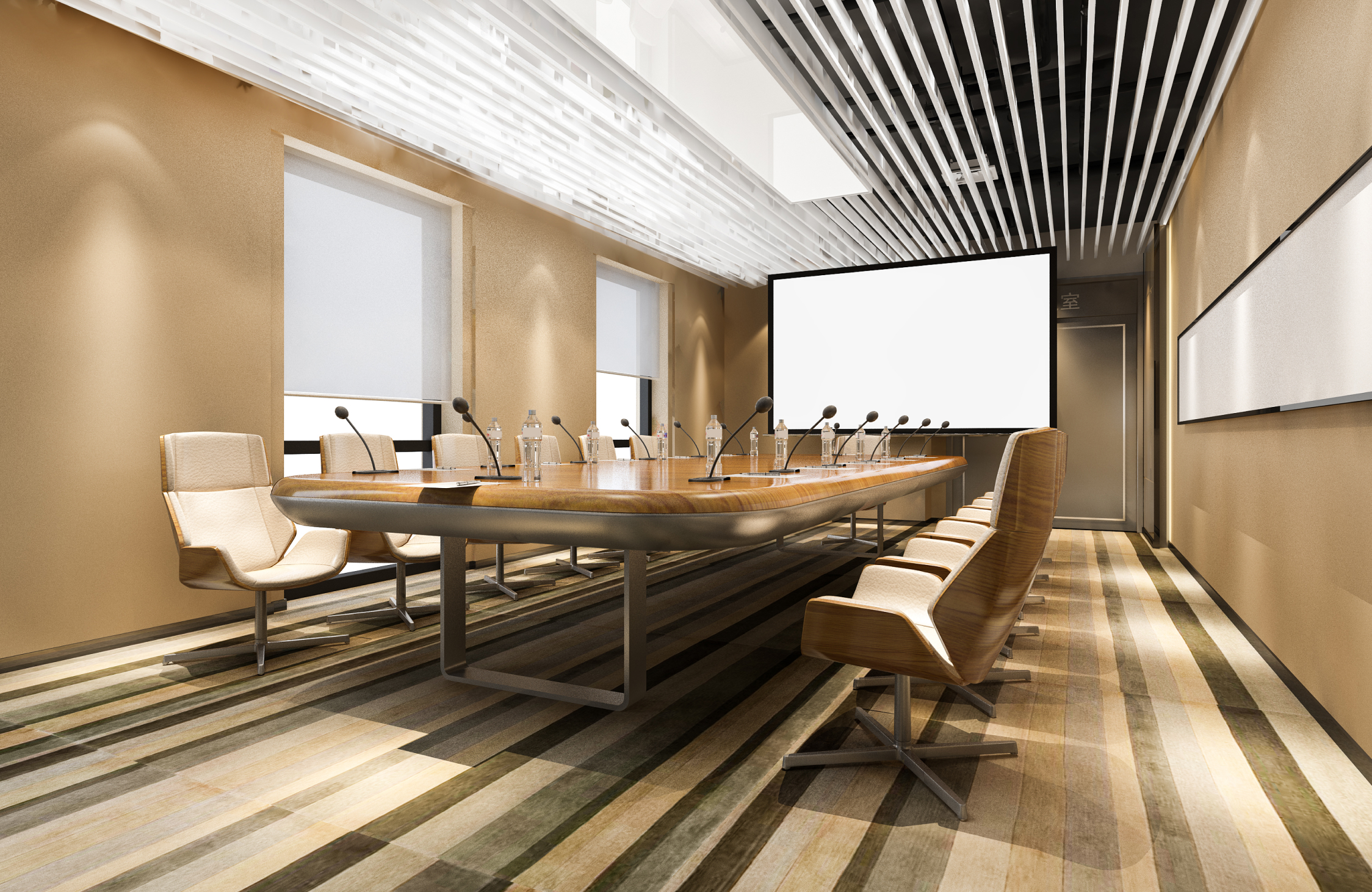 Modern office conference room with a large meeting table, comfortable chairs, display screen, and sophisticated lighting.