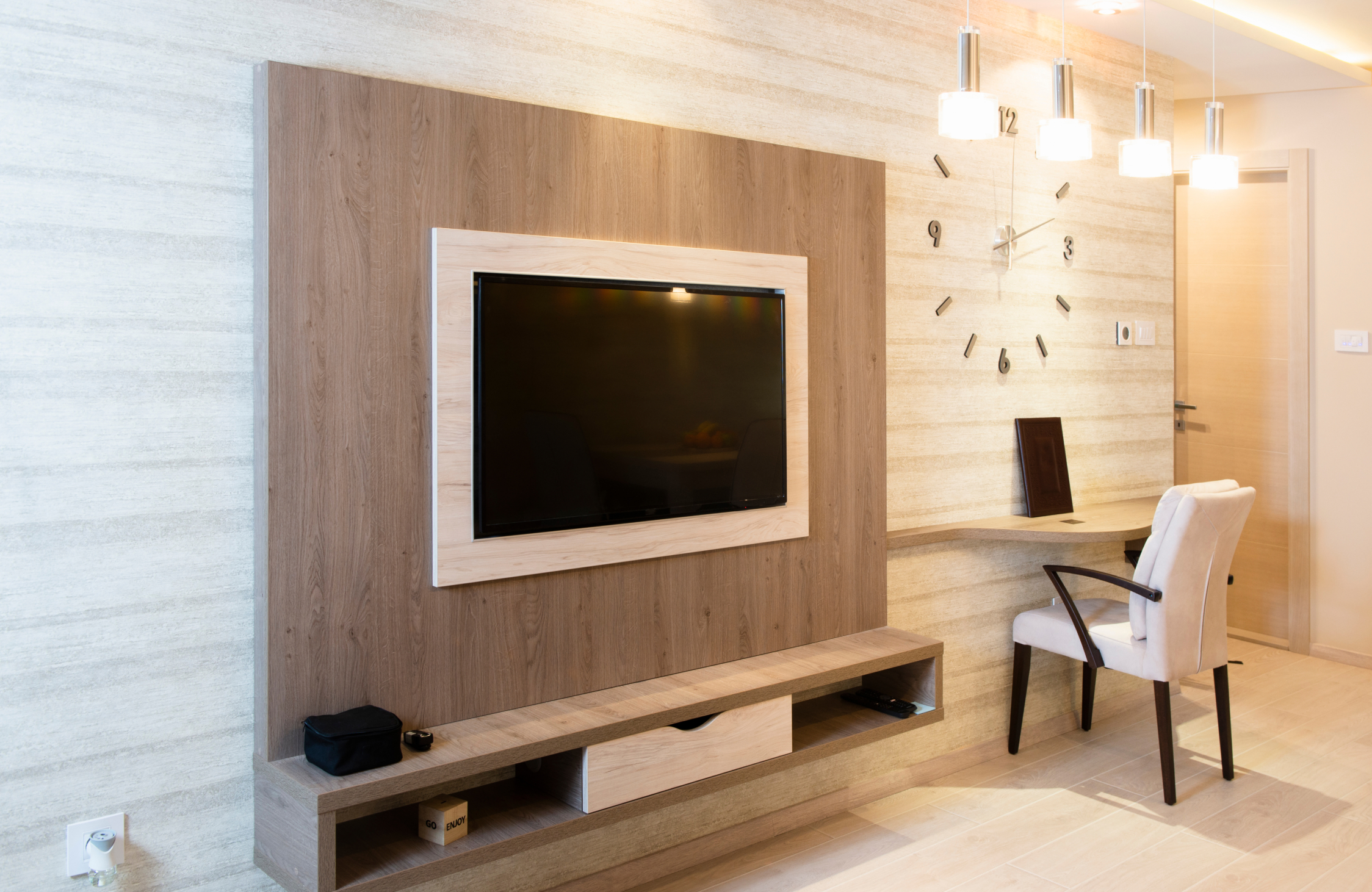 Custom TV unit with concealed storage for small living room